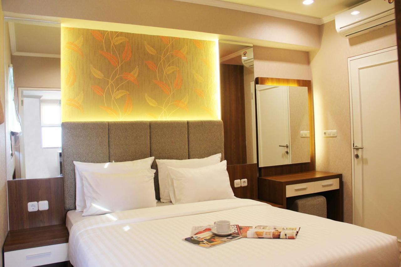 Apartemen Puncak Marina Сурабая Екстериор снимка