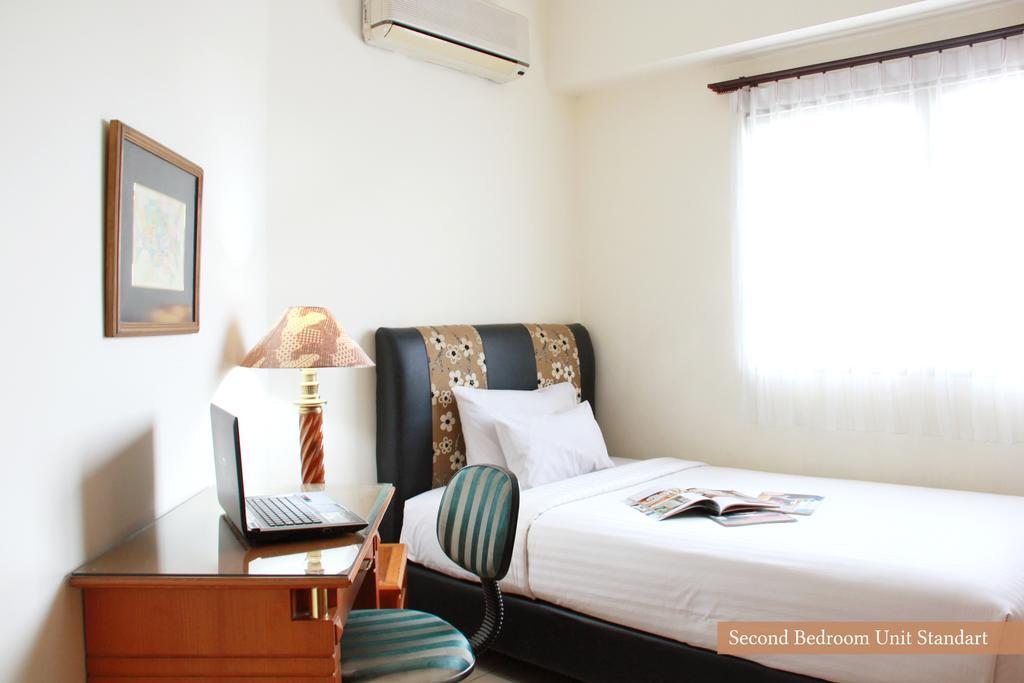 Apartemen Puncak Marina Сурабая Екстериор снимка